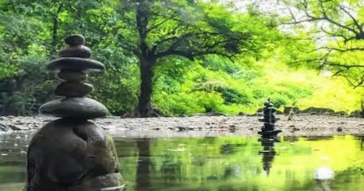 Green stones symbolizing inner peace, balance, and self-growth on the Be Shining blog